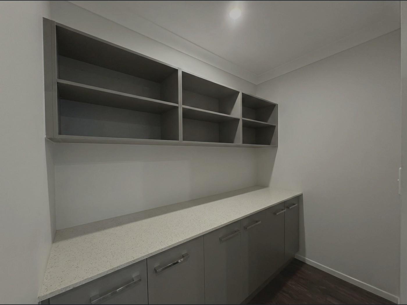 Same room photo before AI decluttering polish