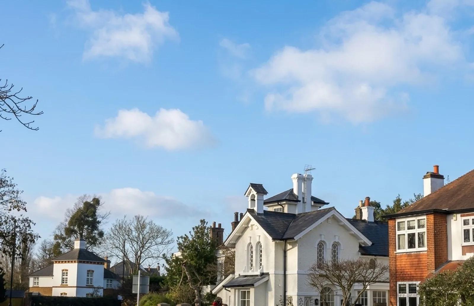 The same property photo with a flat empty sky after Enhancia's AI edit
