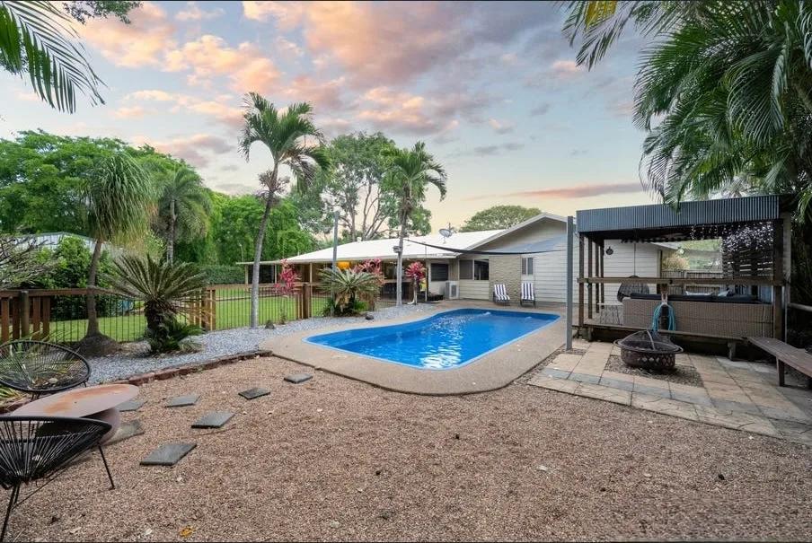 Same house exterior after AI day to dusk conversion showing a twilight sky before